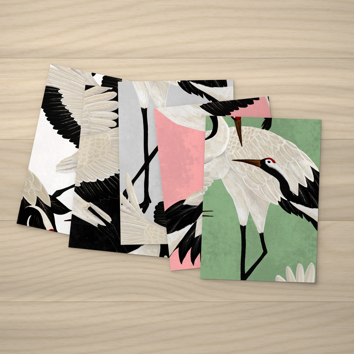 Sample Box: five A3 real paper wallpaper samples fanned out on a wooden table
